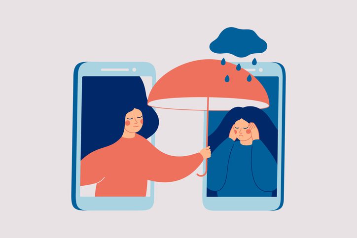 Girl comforts her sad friend over the phone. Woman consoles and cares about girl with psychological problems.